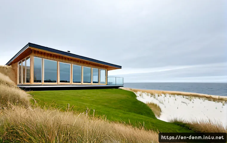 덴마크 디자인과 건축 스타일 - Photorealistic wide-angle exterior of a contemporary Danish coastal home, clean pale brick walls, wa...